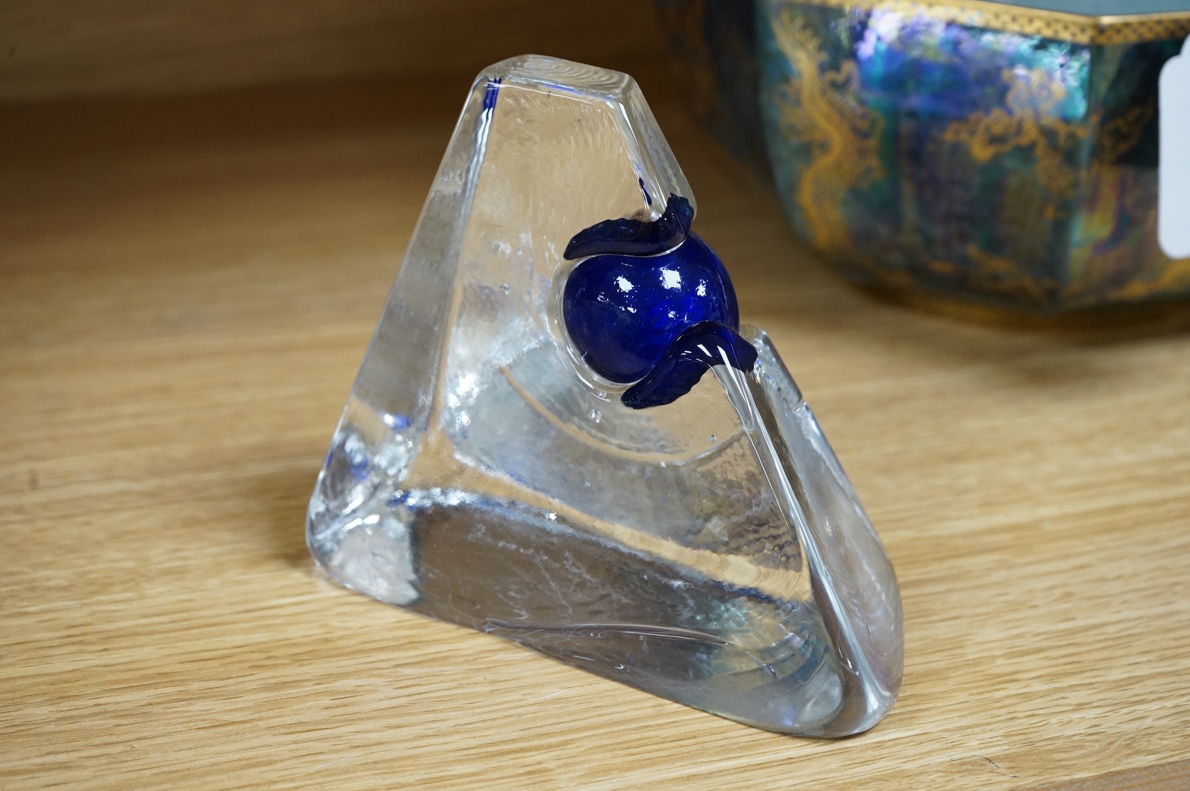 A collection of glassware including a Kosta Boda snowball pot and an Evian advertising water bottle, largest 23cm high